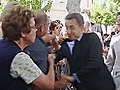Raw Video: Man yanks Sarkozy by shoulder