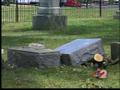 Storm does grave damage to cemetery,  parks