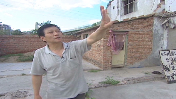 One man fights China’s building boom