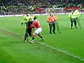 David Beckham tackles pitch invader