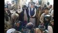 Afghan president buries slain brother