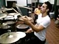 Impressive Guy Juggles Three Drumsticks While Playing The Drums