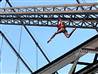 Acrobats scale bridge,  perform high-flying routine