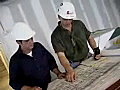 Royalty Free Stock Video SD Footage General Contractor Review Building Plans at a Construction Site in Downtown Ft. Lauderdale,  Florida