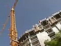 Royalty Free Stock Video SD Footage Pan Left to a Tower Crane at a Construction Site in Ft. Lauderdale,  Florida