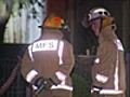 Woman dies but boy rescued from SA fire