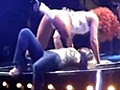 Rihanna gives fan lapdance during show