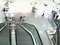 Man Saves Kid Falling Off Escalator