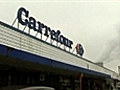 Carrefour dips on profit warning