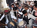 Bomber kills three at Karzai memorial