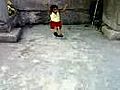 Small boy Sarfaraz (Saifi) in his home sitting on rope