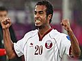 Qatar keep hopes alive