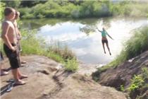 Girl Flies Into Lake Off Bike Jump