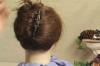 How to updo using a hair comb and a French twist hairstyle.
