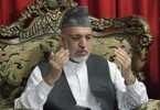 Afghan president mourns loss of slain half-brother