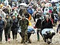 Glastonbury 2011: rain and mud greets festival goers