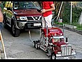 Toy Truck Pulls Car