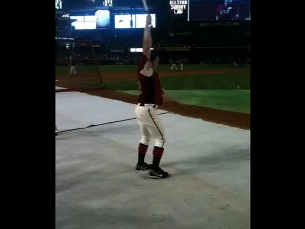 Gary Brown warms up with his bat