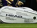 Wimbledon 2011: Alex Bogomolov Jr throws his racquet off the court