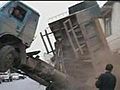 Truck in China loses balance