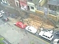 Wall crushes parked car