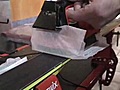 Chris Kolling of Nester’s Sporting Goods demonstrates how to wax skis