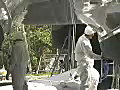 Royalty Free Stock Video SD Footage WZoom Out From Workers at a Boat Yard in Ft. Lauderdale,  Florida