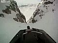 Snowmobile Vs. Mountain