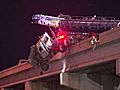 Truck Hangs Off Interstate Overpass