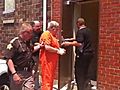 Raw Video: 80-Year-Old Murder Suspect Enters Jail