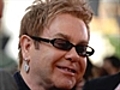 Elton John chooses godparents