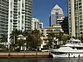 Royalty Free Stock Video HD Footage View of Yacht and High Rise Condos and Office Buildings on the New River in Downtown Ft. Lauderdale,  Florida