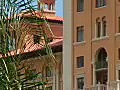 Royalty Free Stock Video HD Footage Zoom Out to the Biltmore Hotel as Cars Pass by in Coral Gables,  Florida