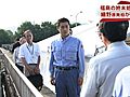 細野原発事故担当相、高濃度放射性物質含む汚泥を保管している福島県の終末処理場を視察