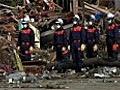 Japan earthquake: minute of silence held for victims