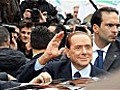 Silvio Berlusconi leaves court after first trial appearance