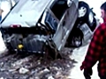 Truck falls through ice