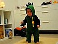 Baby Dressed as Dinosaur Afraid of Toy Dinosaur