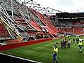 Rescuers search for survivors trapped under stadium rubble