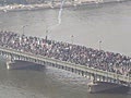 Thousands of Egyptian protesters force police to retreat over bridge