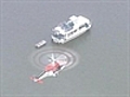 Search for two men after dinghy capsizes