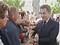 Sarkozy grabbed in crowd visit