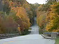 Royalty Free Stock Video HD Footage Scenic View of Fall Leaves,  Roadway and Mountains in North Carolina