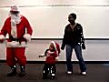 Soulja Santa doing Crank Dat with his little helper.