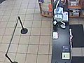 Surveillance video of suspect using stolen credit card