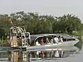 Royalty Free Stock Video SD Footage Airboat Departs on a Tour at Holiday Park in the Everglades in Florida