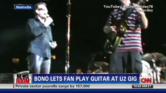 Blind fan plays guitar at U2 concert