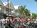 Royalty Free Stock Video HD Footage Pan Up to Motorcycle Bike Week on Duvall Street in Key West Florida