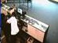 Store Owner Takes Gun Away From Armed Robber