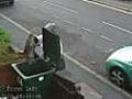 CCTV: Woman bins cat